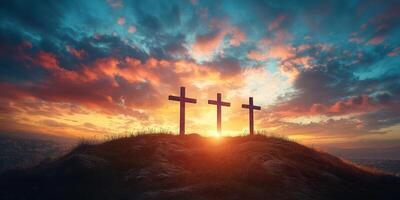 Three crosses at sunset over a hill, symbolizing faith and reflection during a tranquil evening photo