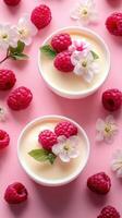 Delightful raspberry desserts adorned with fresh flowers on a vibrant pink background photo