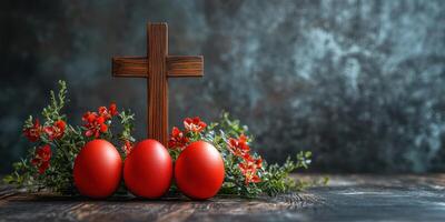 Colorful red eggs and wooden cross with flowers create a festive atmosphere for Easter celebrations photo