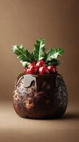 Delicious holiday pudding topped with chocolate and red berries displayed on a neutral background photo