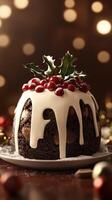 Holiday pudding topped with festive decorations on a warm winter evening photo
