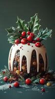 Festive Christmas pudding topped with holly and red berries displayed on a green backdrop photo