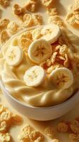 Delicious bowl of creamy dessert with banana slices and crunchy cereal on a light background photo