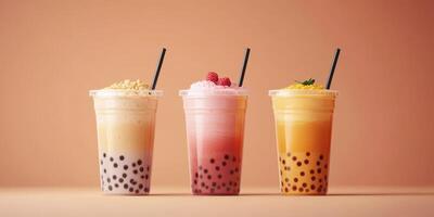 Colorful bubble tea drinks lined up against a simple backdrop showcasing different flavors and textures photo