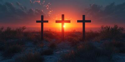 Sunset silhouettes of three crosses against a vibrant sky over a tranquil landscape photo