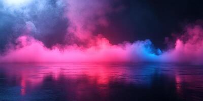 Colorful smoke and mist create an ethereal atmosphere over a reflective surface at night photo