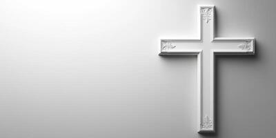 Elegant white cross displayed on a minimalist wall, symbolizing faith and spirituality in a serene setting photo