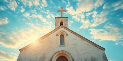 Stunning view of a charming church under a bright sky during sunset in a tranquil rural setting photo