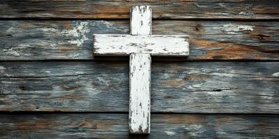 Wooden cross on weathered wooden background evokes a sense of peace and spirituality in a rustic setting photo
