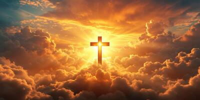 Bright cross illuminated by a radiant sunset among the clouds photo