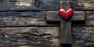 Heart adorned wooden cross resting on rustic wooden surface, symbolizing love and faith in a spiritual context photo