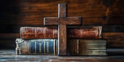 Books stacked with a wooden cross in a serene, rustic setting showcasing religious faith and heritage photo