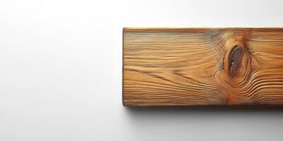Close-up view of a textured wooden plank on a light background showcasing natural patterns and grains photo