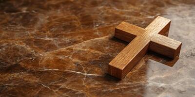 Wooden cross resting on a polished marble surface in a serene setting capturing the essence of faith and devotion photo