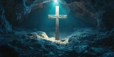 Cross illuminated in a dark cave, symbolizing faith and exploration in a serene underwater environment photo