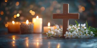 Wooden cross with white flowers and illuminated candles creating a serene atmosphere for reflection and prayer photo