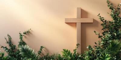 Wooden cross surrounded by lush greenery on a warm wall setting in a serene and peaceful environment photo