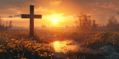 Sunset over a serene landscape with a wooden cross and blooming flowers near a gentle stream photo