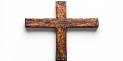 Wooden cross displayed on a white background highlighting craftsmanship and simplicity photo