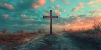 Cross stands alone in a serene landscape at sunset with dramatic clouds and distant hills photo