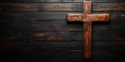 Wooden cross against a dark wooden background, symbolizing faith and spirituality in a serene setting photo