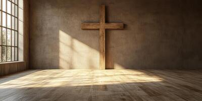 Wooden cross cast in warm light in a minimalistic space with large windows during the day photo