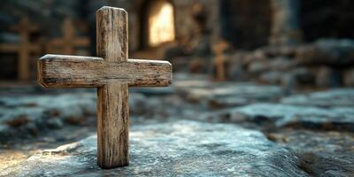 Weathered wooden cross stands in an ancient cemetery surrounded by stone ruins during golden hour photo