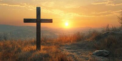 Sunset view with wooden cross in a tranquil landscape during golden hour photo