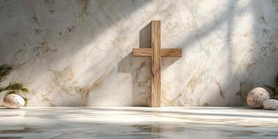 Simple wooden cross on a marble floor surrounded by stones and soft shadows in a serene setting photo