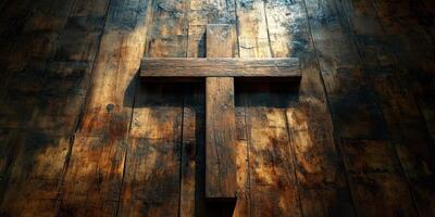 Wooden cross on textured wooden background with dramatic lighting and shadows creates a spiritual atmosphere photo