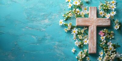Cross surrounded by white daisies on a turquoise background for a serene spiritual atmosphere photo