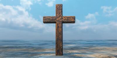 Wooden cross standing on a rocky shore under a bright sky and fluffy clouds during the day photo