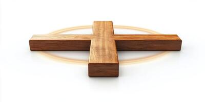 Wooden cross on a white background with a subtle light halo effect highlighting its texture and form during a calm moment photo
