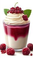 Delicious dessert served in a glass with layers of cream, raspberry sauce, and fresh berries on top photo