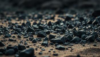 Dark Stones on a Sandy Beach Close-Up photo