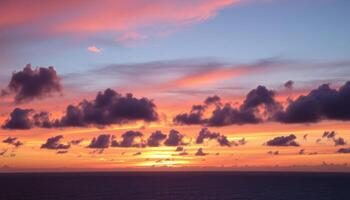 Stunning Sunset over Calm Ocean with Colorful Clouds photo
