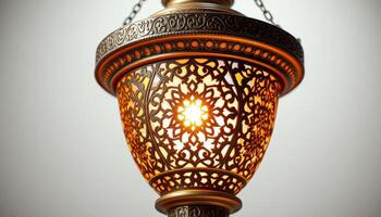 Ornate Metal Lantern with Warm Light and Intricate Cutouts photo