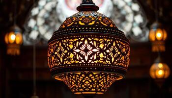 Intricate Metal Lantern with Warm Light Glowing Through Ornate Cutouts photo