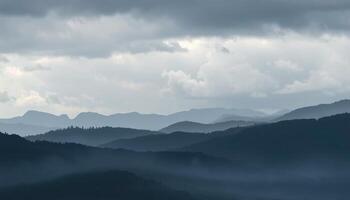 Misty Mountain Range Panorama In Soft Light photo