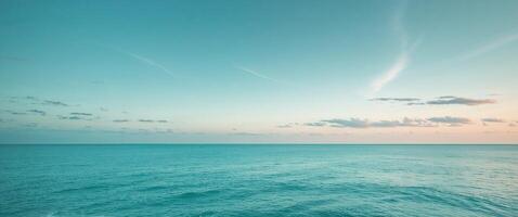 Serene Ocean Horizon Calm Teal Sea and Soft Blue Sky. photo