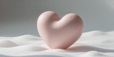 a close up of a pink heart shaped object on a white surface. photo