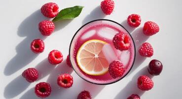 Raspberry lemonade with fresh raspberries and lemon slices photo