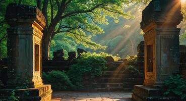 Ancient stone structure surrounded by lush greenery and sunlight filtering through trees during late afternoon photo