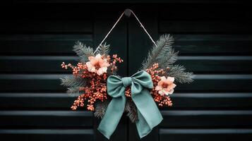 Elegant Peach Blossom Evergreen Christmas Wreath with Teal Bow Hanging Door Decoration photo