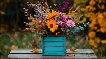 Vibrant Autumn Floral Arrangement in Teal Wooden Box Rustic Fall Flowers photo