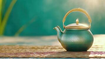 Serene Teal Teapot on Woven Mat Tranquil Outdoor Scene Summer Relaxation photo