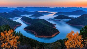 Breathtaking Panoramic View of Serene Mountain Lake at Dawn Misty Hills and Autumn Foliage photo