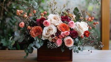 Elegant Autumnal Rose and Ranunculus Flower Arrangement in Wooden Box photo