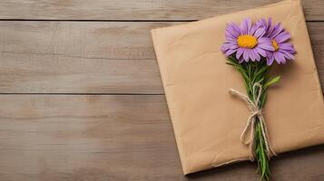 Delicate Purple Flowers Bouquet on Rustic Wooden Background with Kraft Paper photo