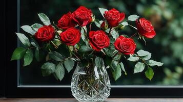Exquisite Bouquet of Deep Red Roses in Crystal Vase by Window photo